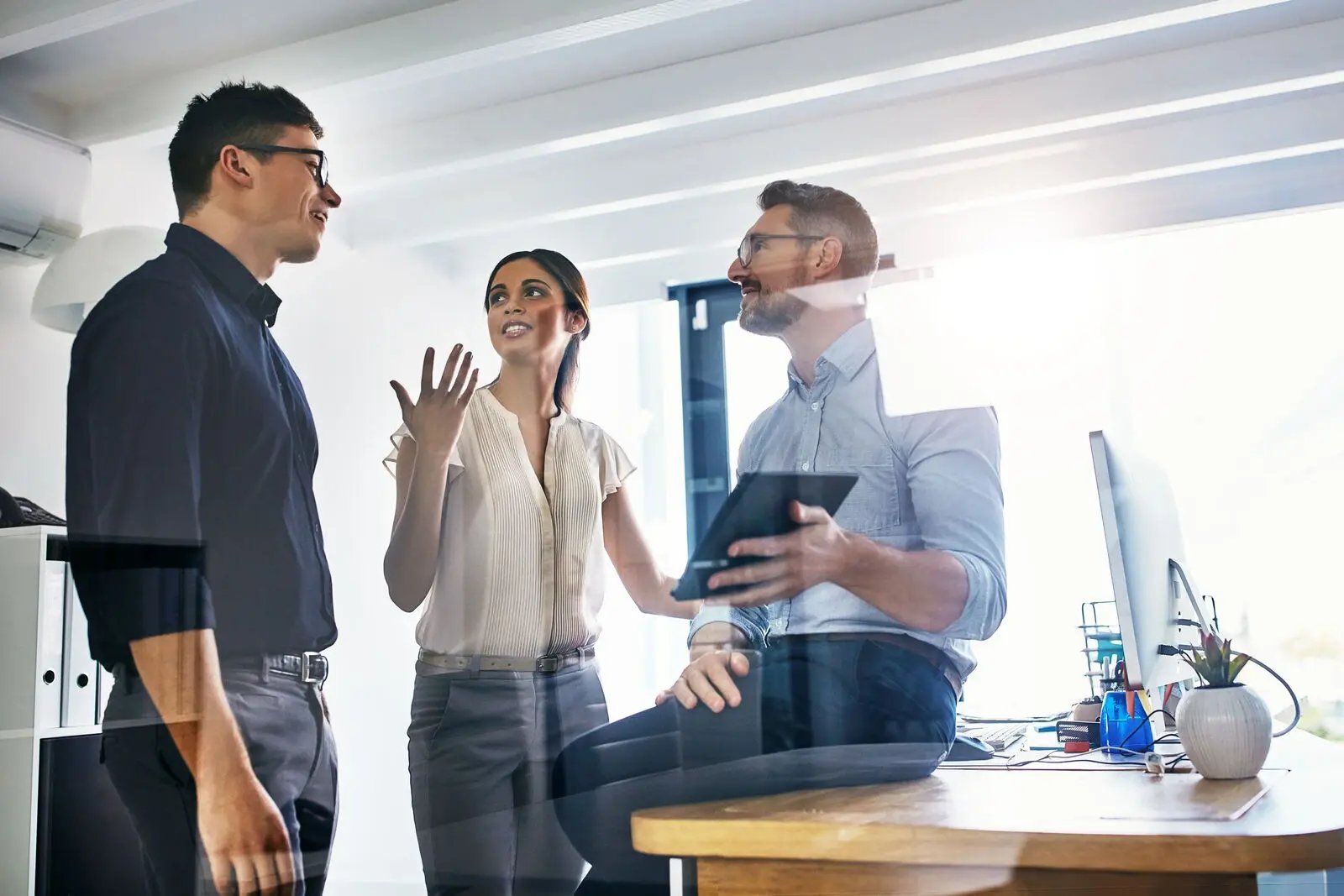 discussion standing in an office