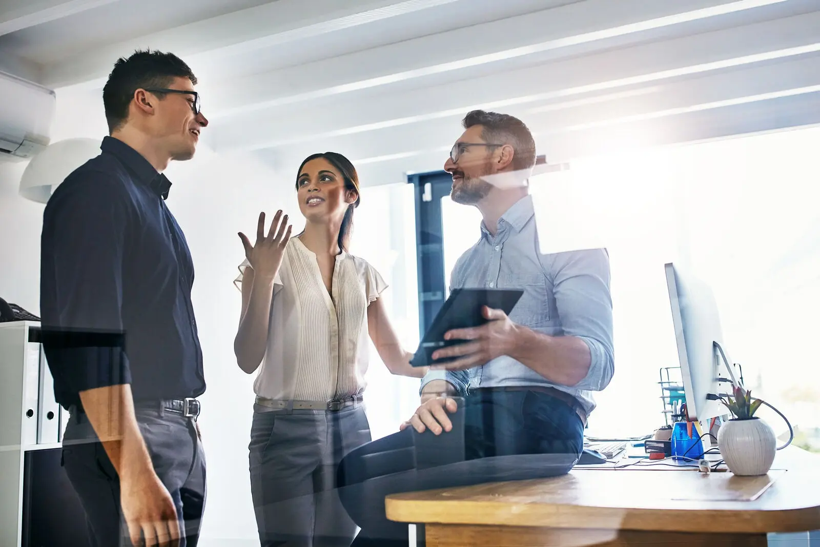 discussion standing in an office